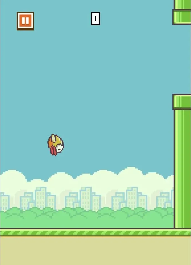 The embedded Flappy Bird game mid-run, captured during our August 17, 2026 play session: the bird tilted nose-down in a dive between flaps, the score counter and pause button visible at the top, and a pair of green pipes scrolling in from the right edge with the gap between them.