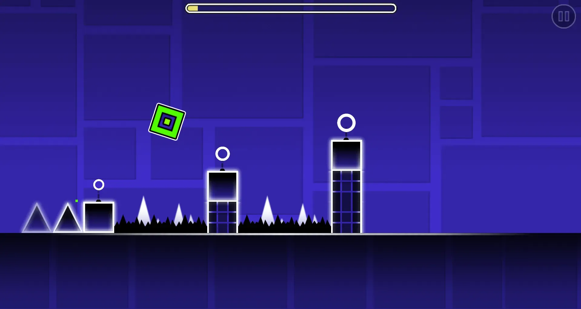Geometry Dash cube jumping over spikes in the Stereo Madness level
