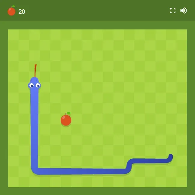 Google Snake gameplay showing a long snake avoiding its own tail